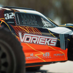 1/10 VORTEKS MEGA 550 Brushed 2WD Stadium Truck RTR with Battery & Charger,