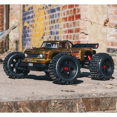 OUTCAST 4X4 4S BLX 1/10 Stunt Truck Bronze plus G2 5000mAh 3S LiPo IC5 & S155